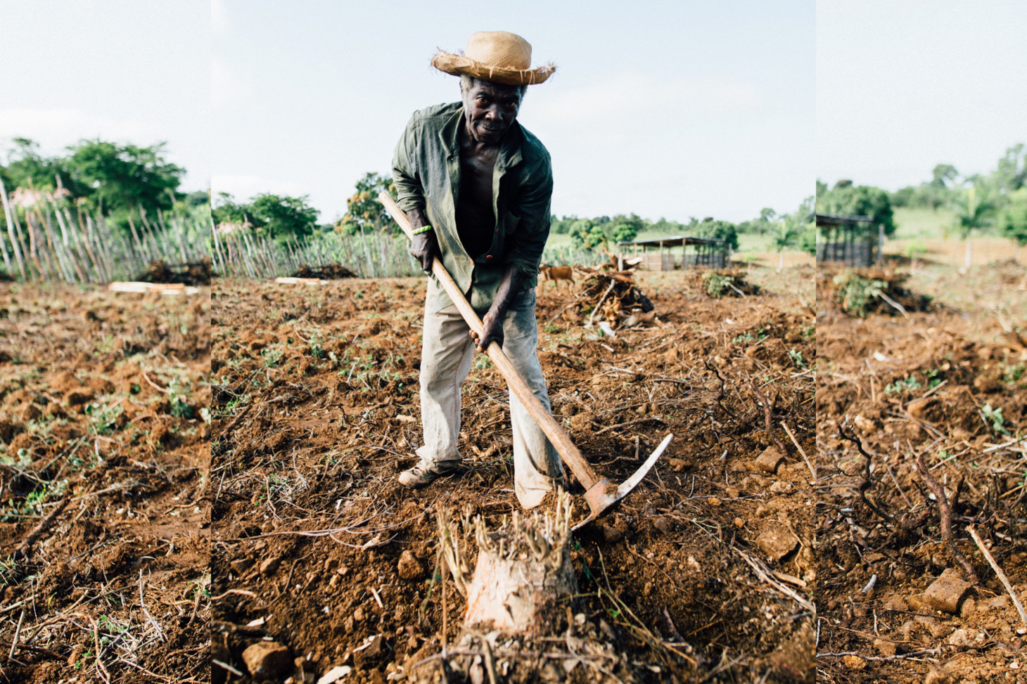 African man digging.