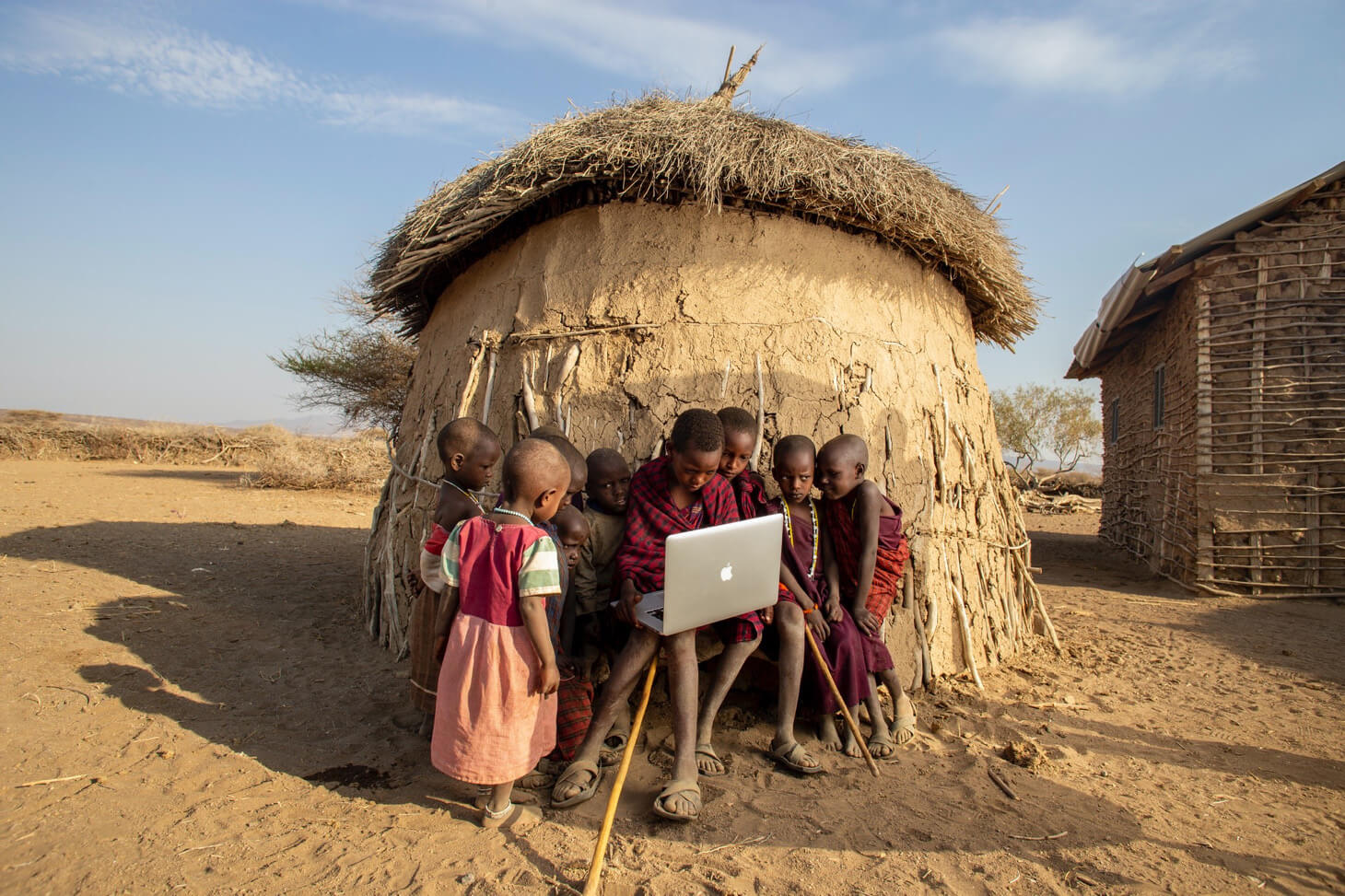 Local African boys using a laptop